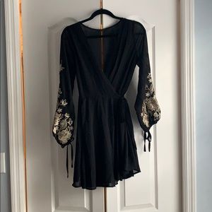 Beautiful wrap dress with embroidered gold sleeves
